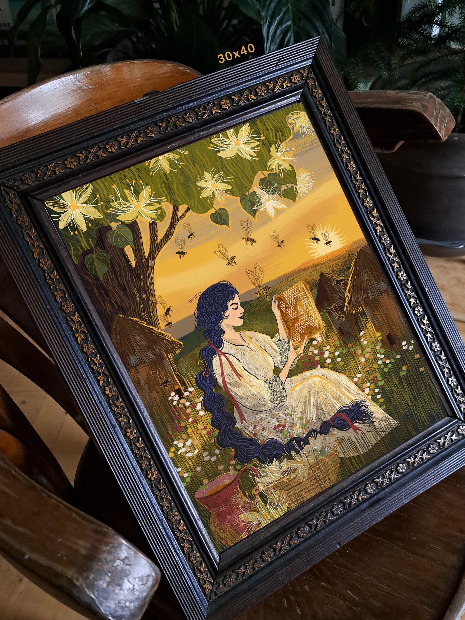Wydruk artystyczny „Kraina miodu" w ciemnej ozdobnej ramie 30×40 cm – folk art print Natalii Noszczyńskiej, Black Dog Studio